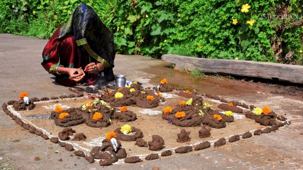 woman performing govardhan puja rituals